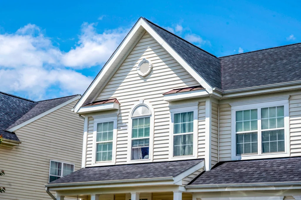 Residential home featuring white siding
