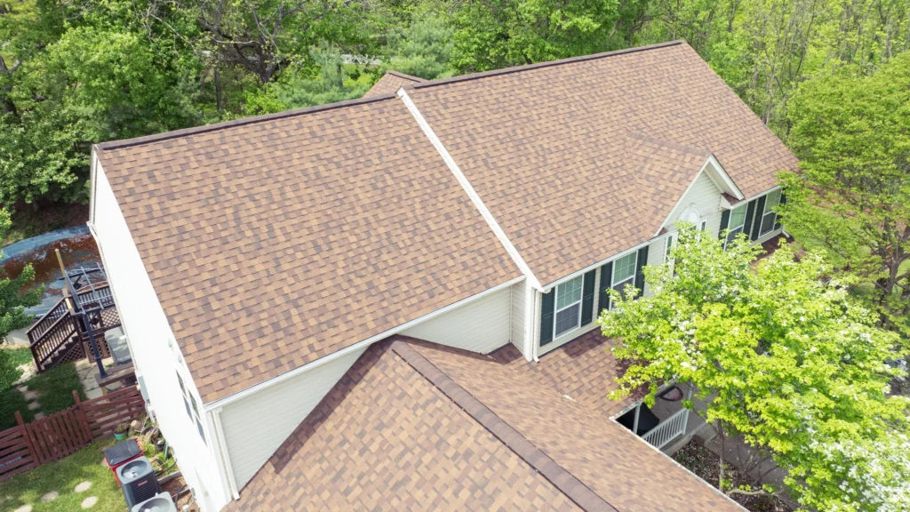 Light brown roof installed on a residential home, featured on our contact page